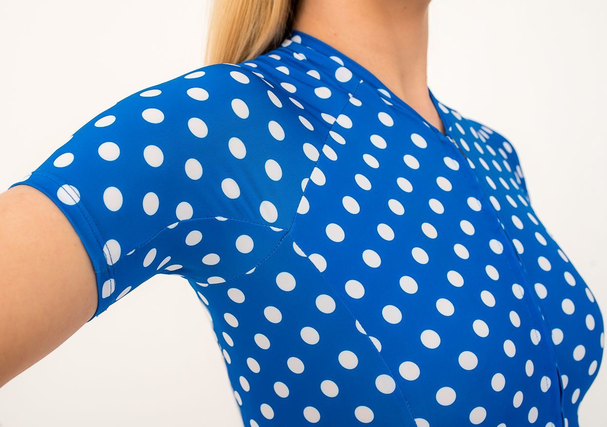 Pattern of a high-performance sports dress, blue with white polka dots.
