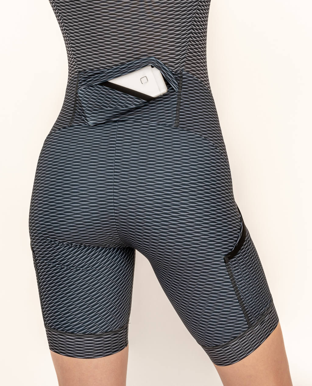 Pockets in a women's running suit.